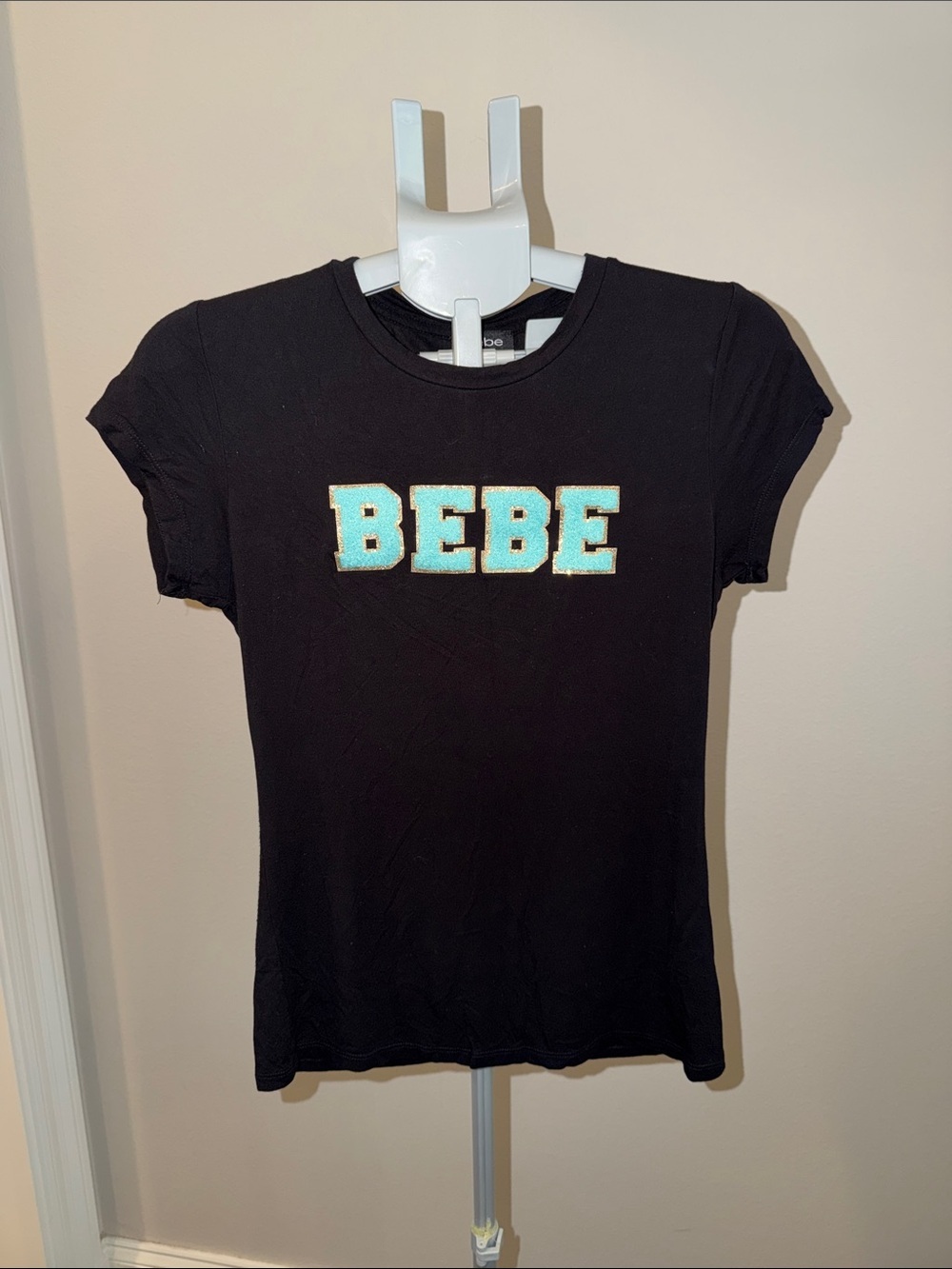 bebe Black Tee with Aqua and Gold Embroidered Logo